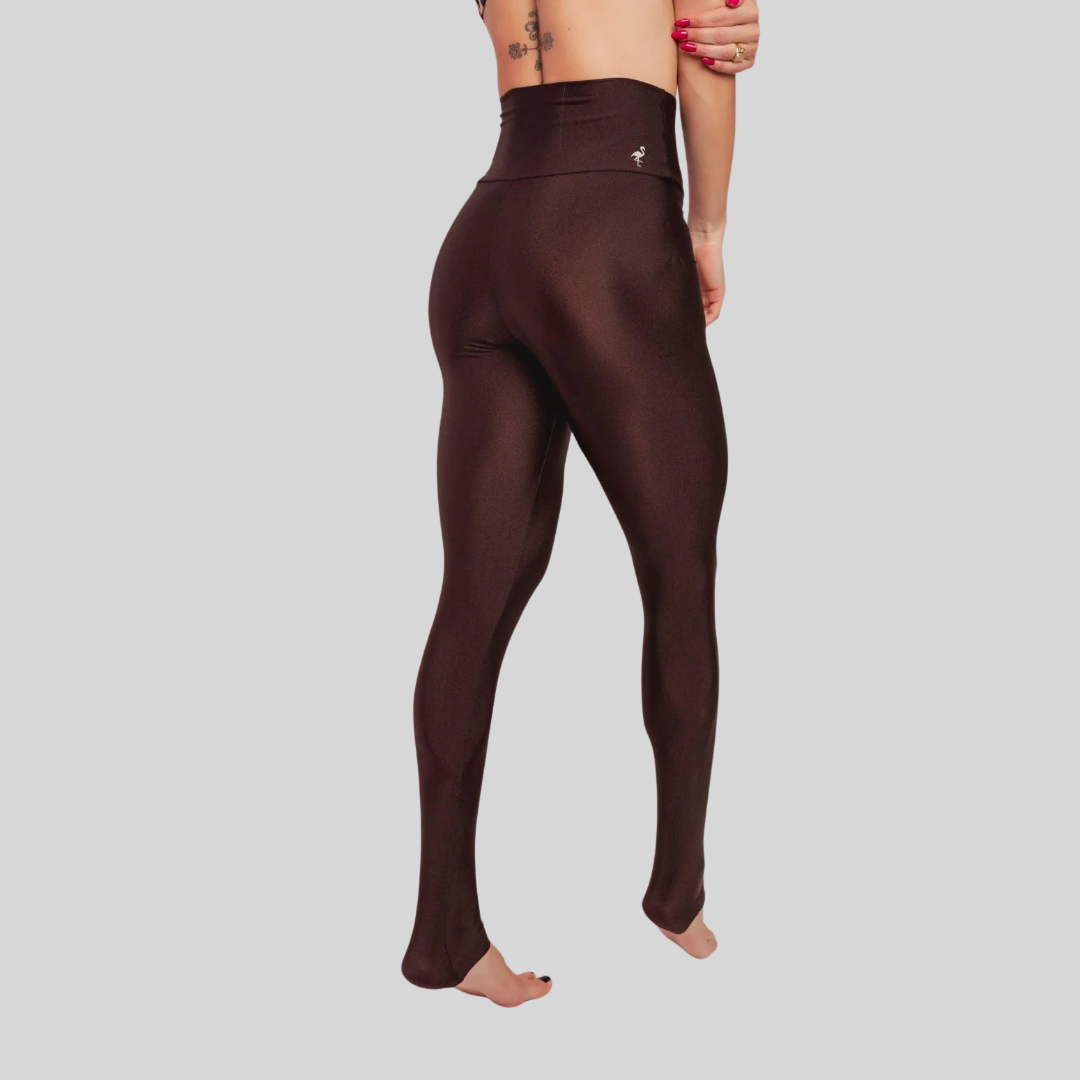 Brown leggings worn by a person on a light gray background