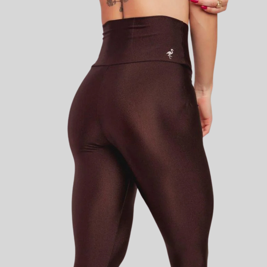 Brown leggings with a logo on a gray background