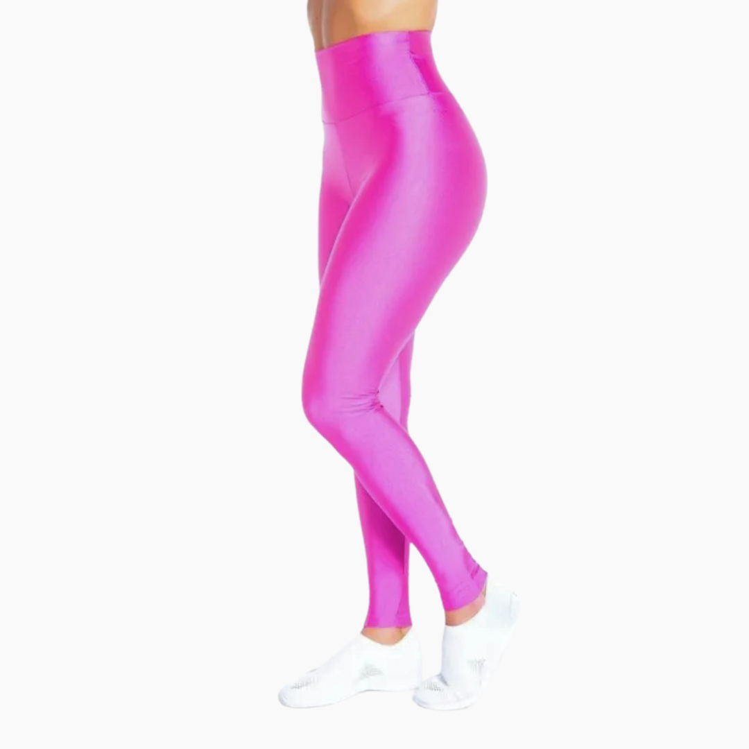 Pink leggings worn by a person on a white background