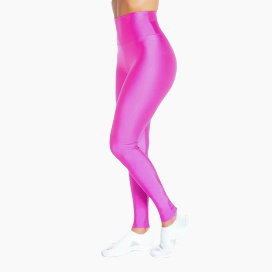 Pink leggings worn by a person on a white background
